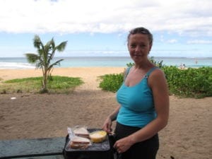 Nancy Power enjoying our picnic at Tunnels Beach in Kauai, Hawaii