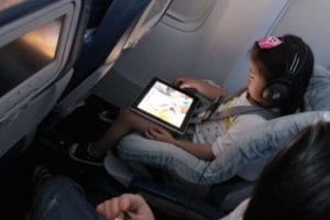 8 Tips For Airline Travel TV using ipad on plane