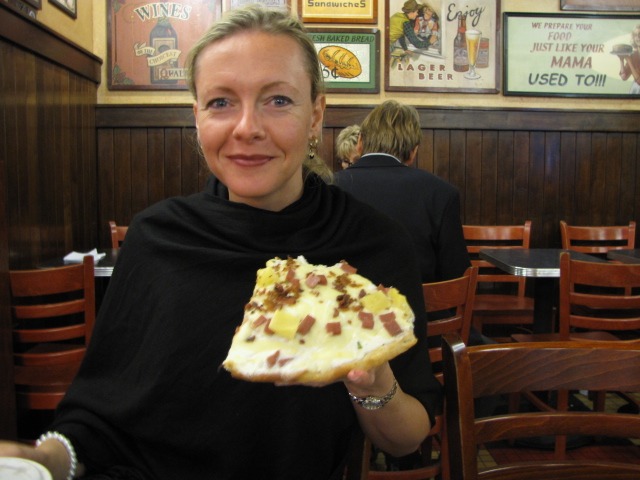 Nancy Power enjoying a slice of New York Pizza