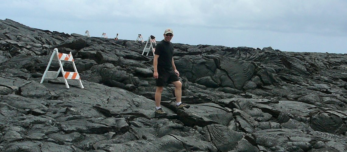 Shawn walking on hardened lava